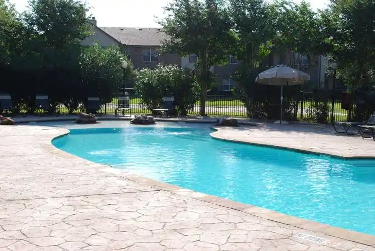 Rental by Apartment Wolf | Trails at Corinthian Creek | 8655 Jones Rd, Jersey Village, TX 77065 | apartmentwolf.com