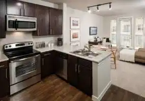 Rental by Apartment Wolf | The Flatiron District at Austin Ranch | 6815-6855 Windhaven Pky, The Colony, TX 75056 | apartmentwolf.com