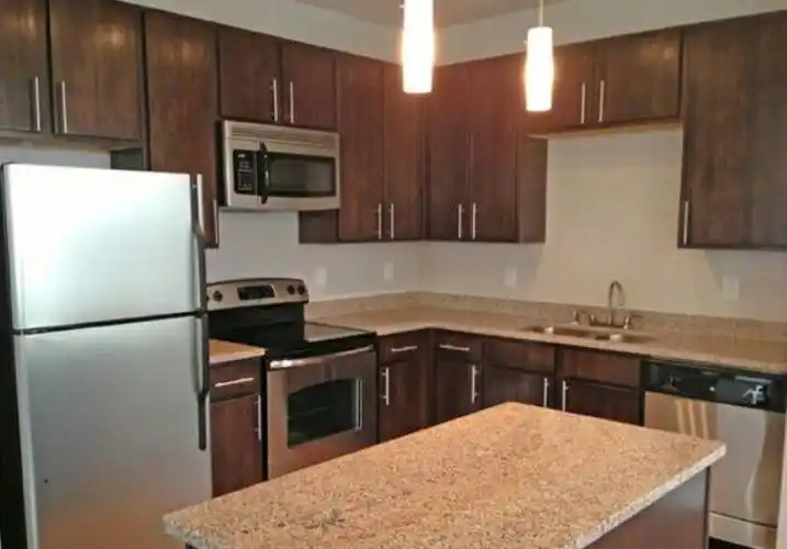 Rental by Apartment Wolf | The Flatiron District at Austin Ranch | 6815-6855 Windhaven Pky, The Colony, TX 75056 | apartmentwolf.com