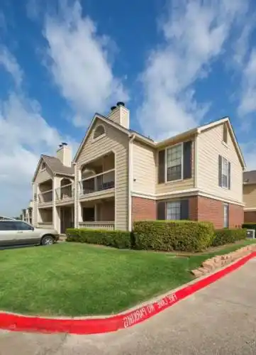 Rental by Apartment Wolf | The Arbors of Carrollton Apartments | 2240 E Trinity Mills Rd, Carrollton, TX 75006 | apartmentwolf.com