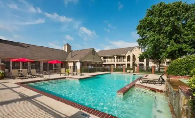 Rental by Apartment Wolf | The Arbors of Carrollton Apartments | 2240 E Trinity Mills Rd, Carrollton, TX 75006 | apartmentwolf.com